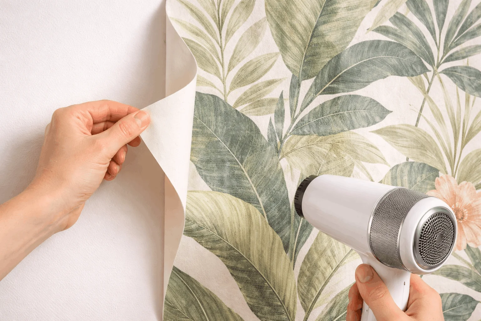 Damage-free removal of temporary wallpaper from a rental wall to protect security deposit.